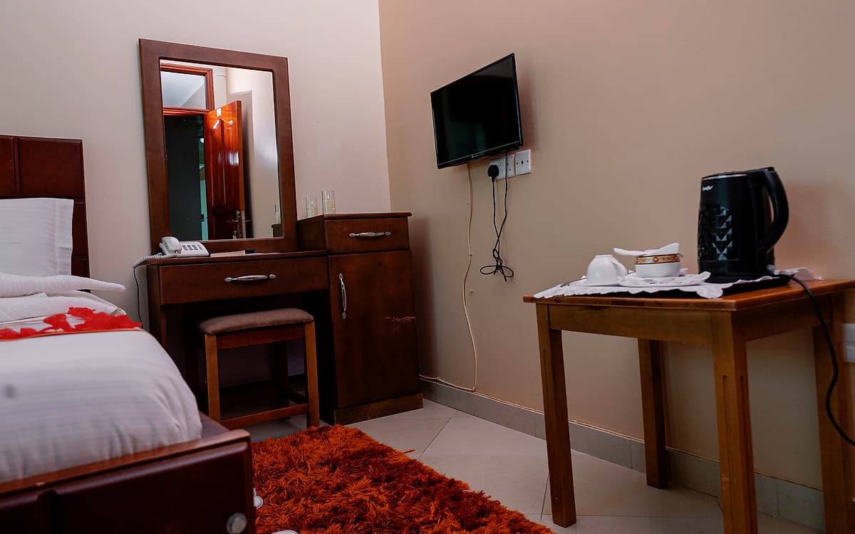 The desk, television and dressing table in the executive room