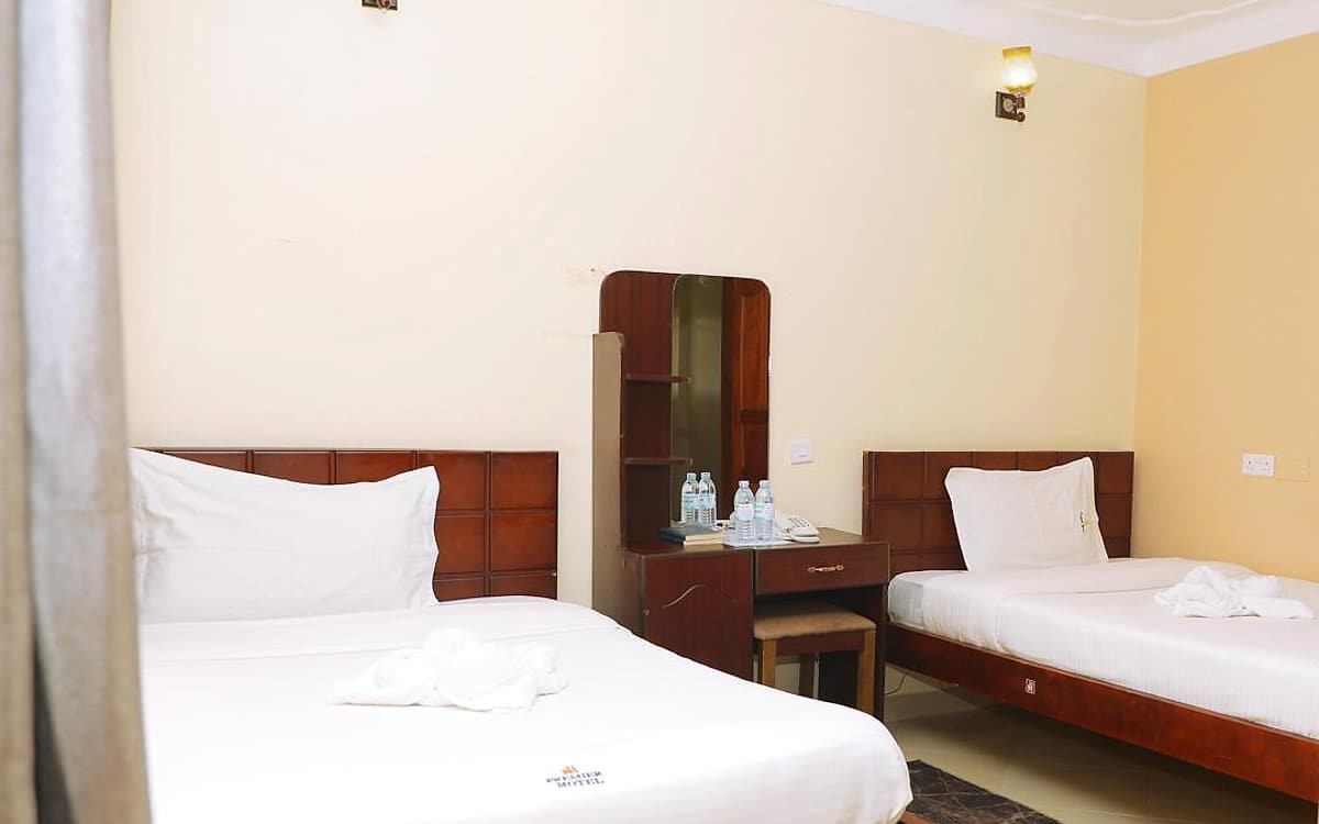 The twin room from the foot of the nearest bed